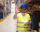 demo-attachment-902-warehouse-worker-standing-large-storage-center-showing-ok-hand-gesture-satisfied-delivering-goods